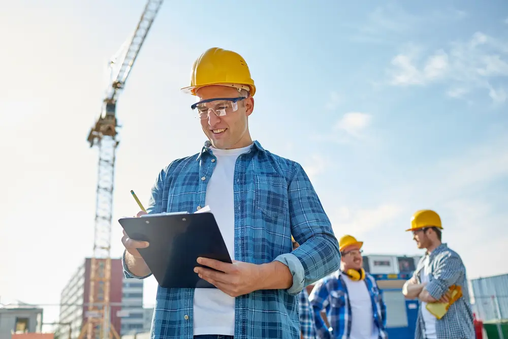 OSHA inspector conducting 2025 workplace safety audit.